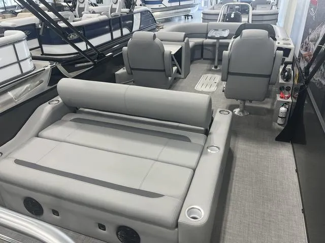 Slide: The Image of 2025 Bentley Pontoons 223 Swingback interior with luxurious seating and modern design. - 2