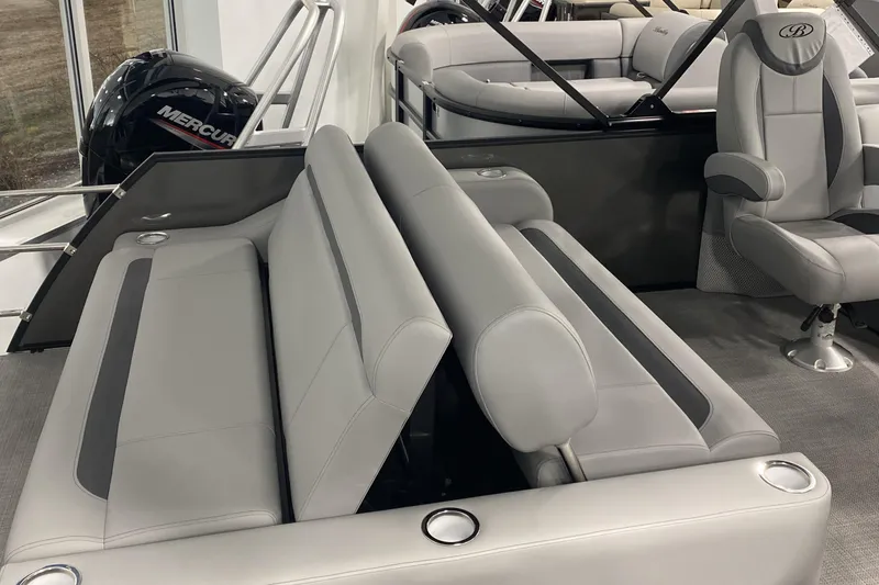 Slide: The Image of 2025 Bentley Pontoons 223 Swingback interior with gray seating and modern design. - 4
