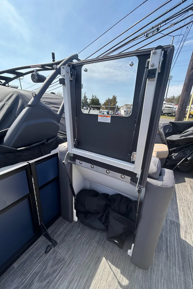Slide: The Image of 2025 Viaggio Lago X-U boat interior with foldable seat and storage compartment. - 13