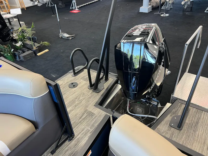 Slide: The Image of 2025 Viaggio Lago X-U boat interior with Mercury outboard motor, showcasing seating and deck design. - 25