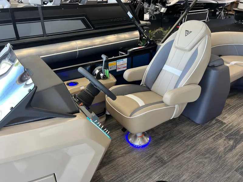 Slide: The Image of 2025 Viaggio Lago X-U boat interior with modern captain's chair and control panel. - 34