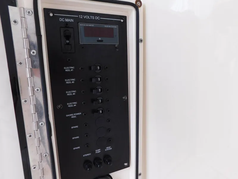 Slide: The Image of Electrical panel on 2013 Hydra-Sports 4200 Siesta boat, featuring 12 volts DC controls. - 12
