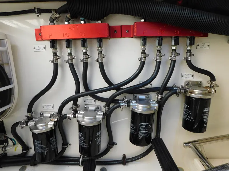 Slide: The Image of Hydra-Sports 4200 Siesta 2013 engine compartment with fuel filters and hoses. - 19