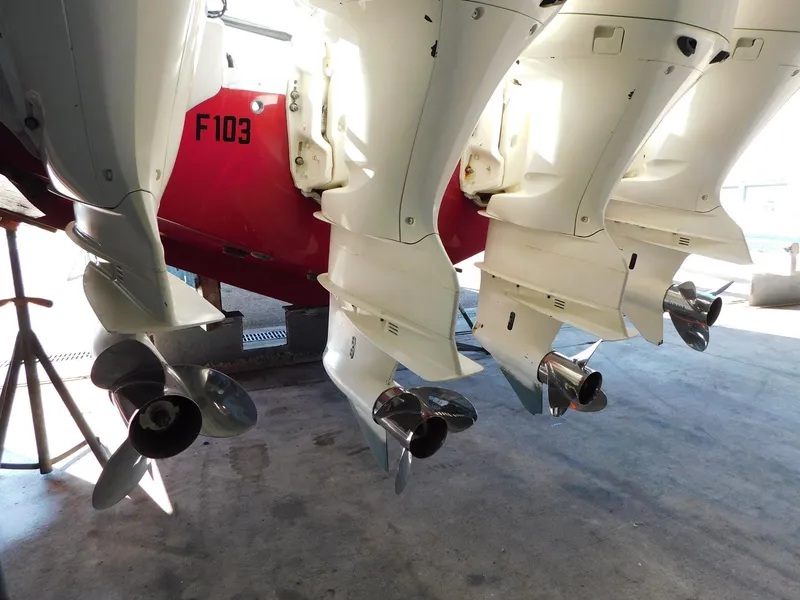 Slide: The Image of Four outboard motors on a 2013 Hydra-Sports 4200 Siesta boat. - 24