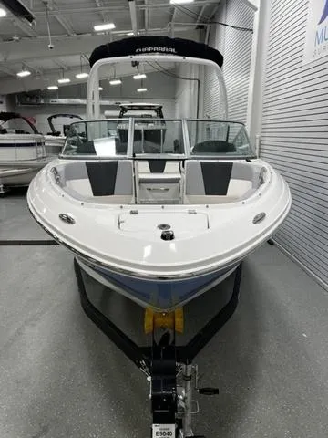 Slide: The Image of 2024 Chaparral 21 SSI Sport boat in showroom, front view. - 3