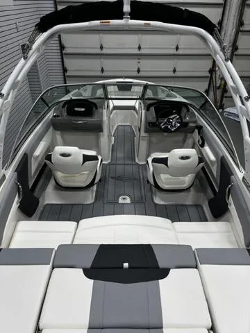 Slide: The Image of 2024 Chaparral 21 SSI Sport boat interior with sleek seating and modern design. - 6