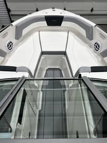Slide: The Image of 2024 Chaparral 21 SSI Sport boat interior with sleek seating and modern design. - 7