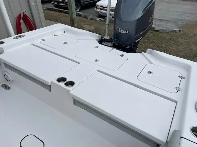 Slide: The Image of 2019 Sportsman 267 Masters boat seats with gray upholstery and armrests. - 10