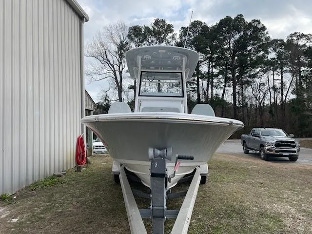 Slide: The Image of 2019 Sportsman Masters 267 Bay Boat docked with Yamaha outboard motor. - 2