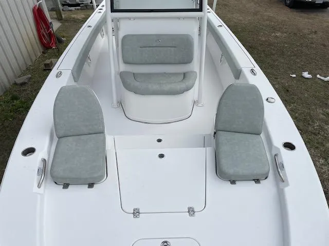 Slide: The Image of 2019 Sportsman 267 Masters boat interior with seating and storage compartments. - 9
