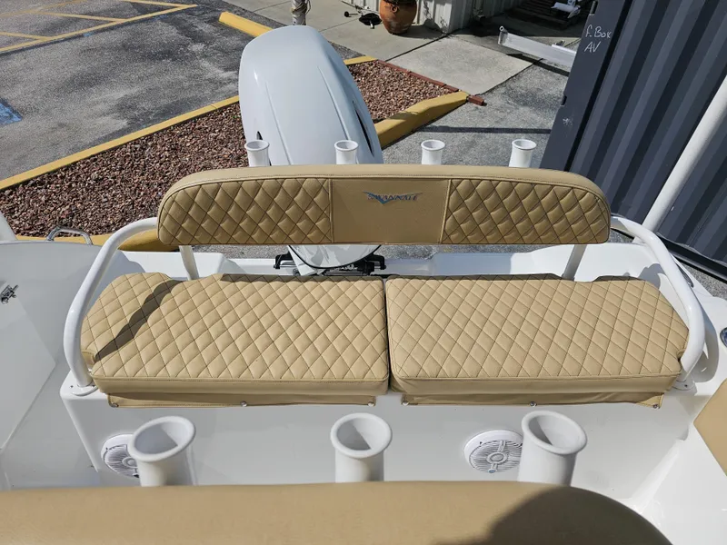 Slide: The Image of 2025 Savannah 2200 Offshore boat with tan quilted seating and rod holders. - 10
