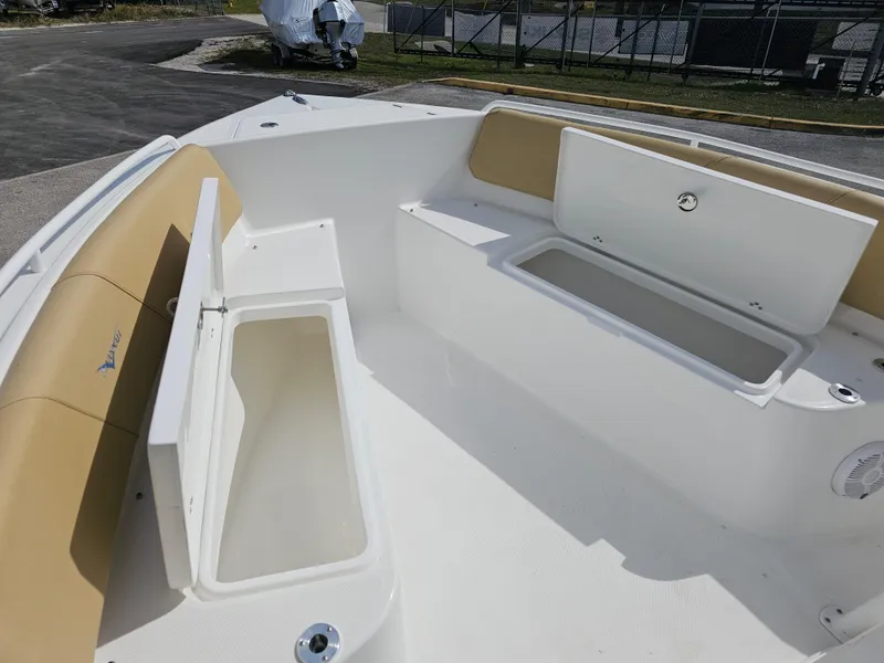Slide: The Image of 2025 Savannah 2200 Offshore boat interior with storage compartments and seating. - 12
