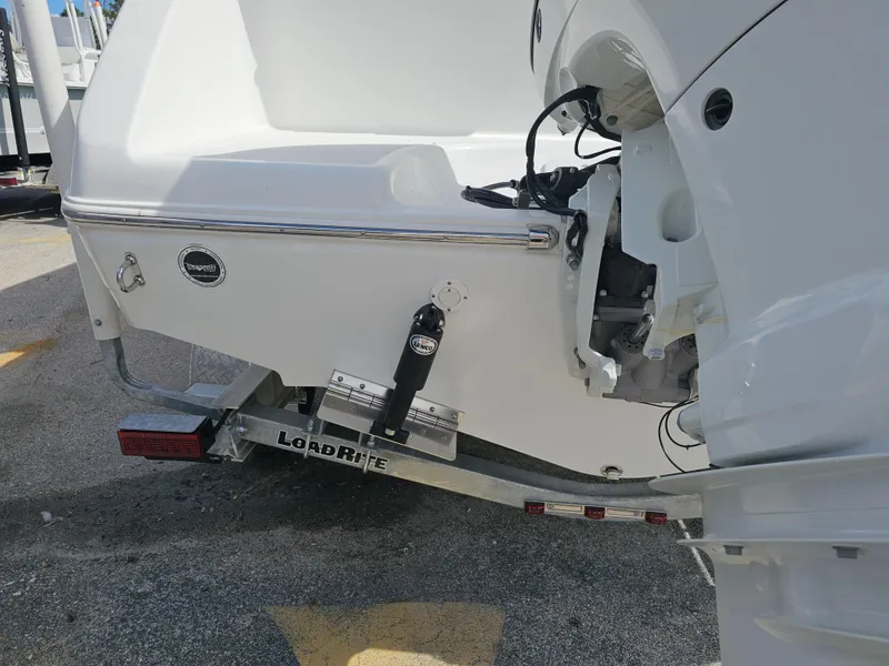 Slide: The Image of 2025 Savannah 2200 Offshore boat on Load Rite trailer, rear view. - 17