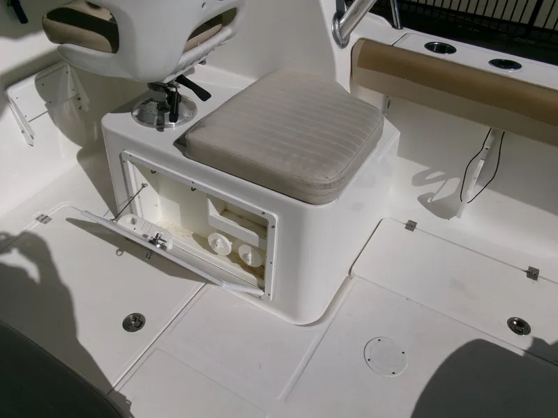Slide: The Image of 2016 Sea Fox 256 Voyager boat interior with seating and storage compartment. - 19