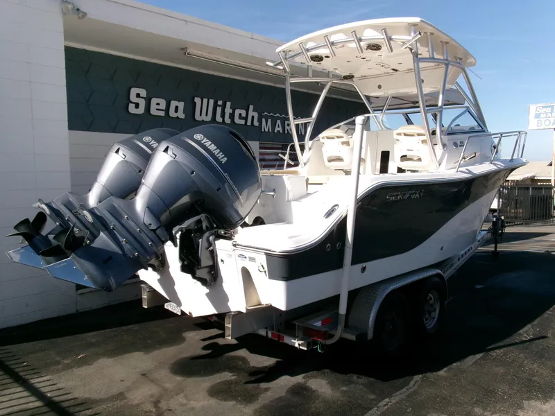 Slide: The Image of 2016 Sea Fox 256 Voyager boat with twin Yamaha engines at Sea Witch Marine. - 2