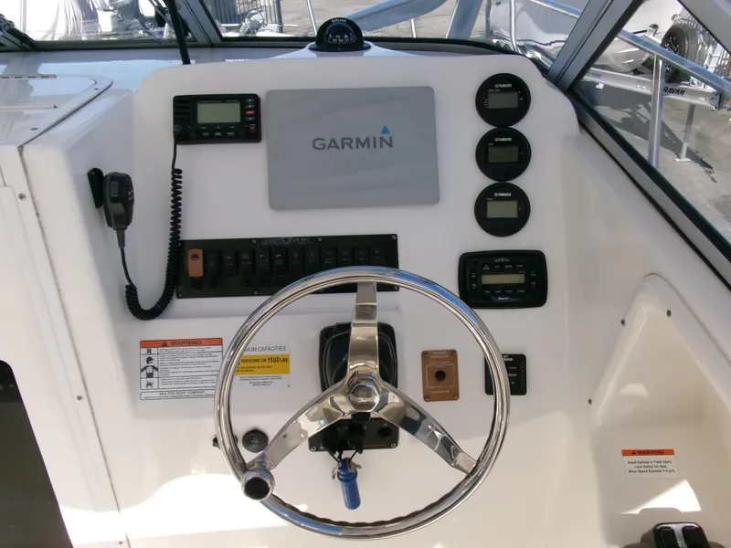 Slide: The Image of Control panel of a 2016 Sea Fox 256 Voyager boat with Garmin navigation system. - 7