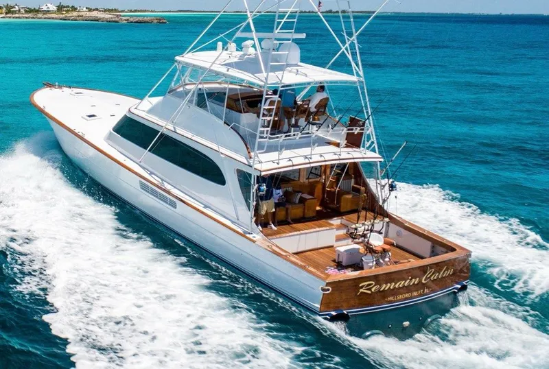 Slide: The Image of Merritt 80' Sportfish yacht cruising in clear blue ocean waters, 2000 model. - 1