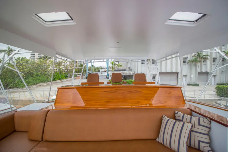 Slide: The Image of Luxurious interior of 2000 Merritt 80' Sportfish yacht with plush seating and elegant design. - 21
