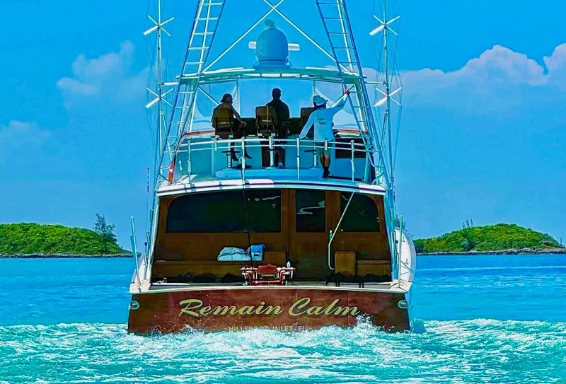Slide: The Image of Merritt 80' Sportfish yacht "Remain Calm" cruising in clear blue waters, 2000 model. - 3