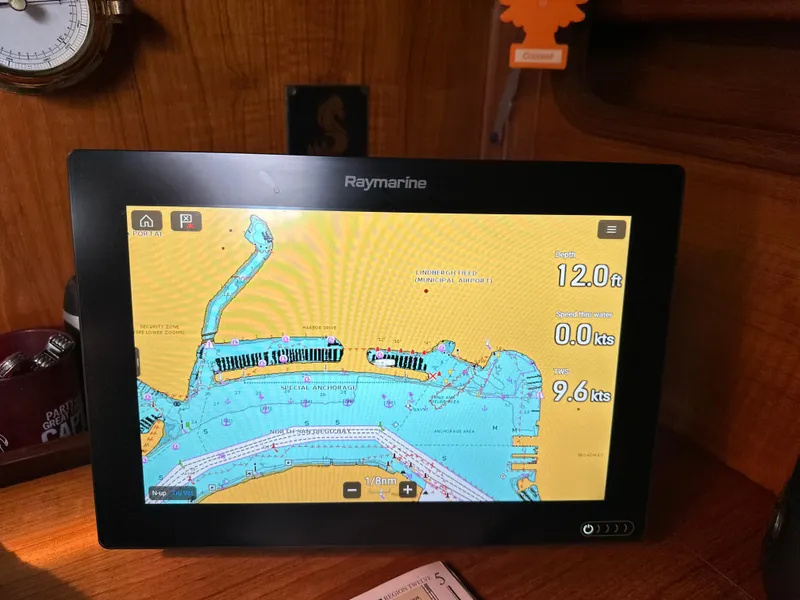 Slide: The Image of Raymarine navigation display on 1986 Beneteau First 375 sailboat, showing nautical chart and depth. - 25