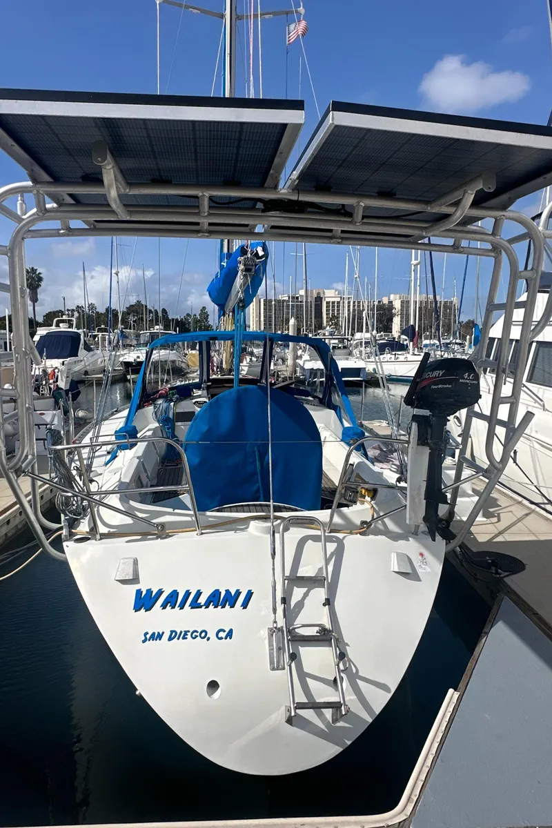 Slide: The Image of 1986 Beneteau First 375 sailboat docked in San Diego marina with solar panels. - 5