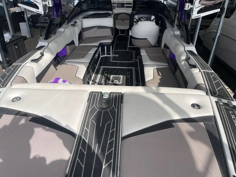 Slide: The Image of 2019 Centurion Fi25 boat interior with spacious seating and modern design. - 11