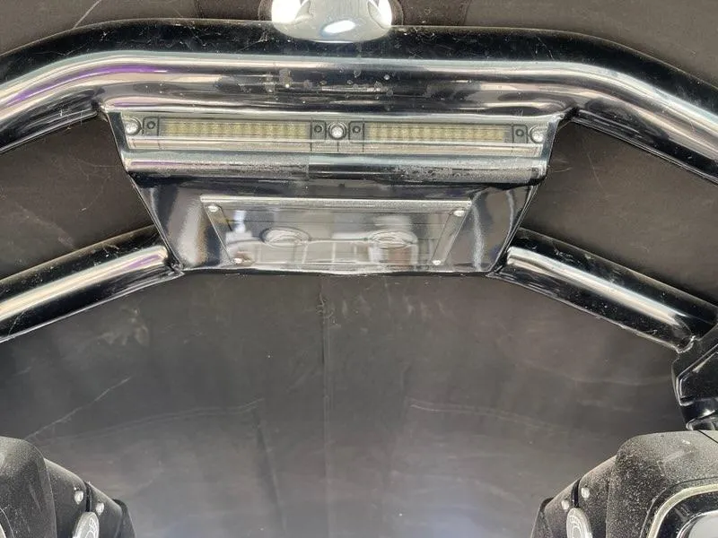 Slide: The Image of 2019 Centurion Fi25 boat interior with sleek black framework and lighting. - 23