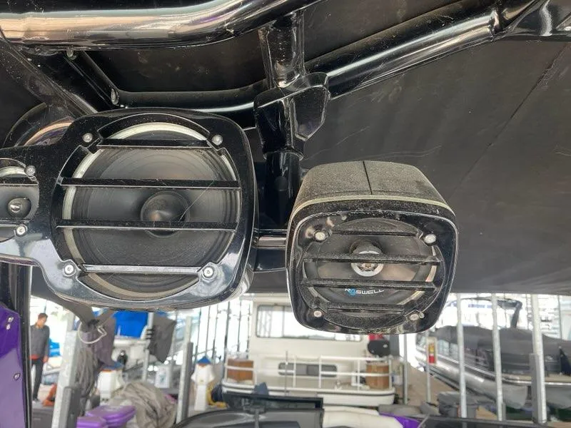 Slide: The Image of 2019 Centurion Fi25 boat speakers mounted under a black canopy. - 24