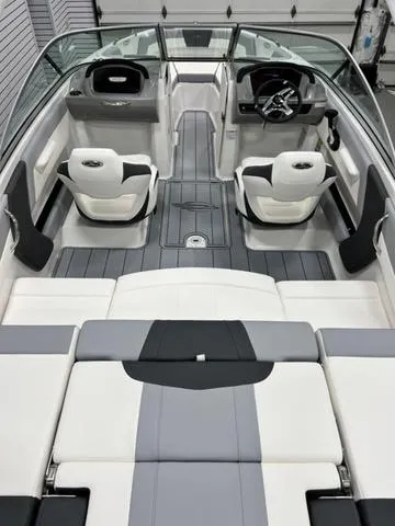 Slide: The Image of 2024 Chaparral 21 SSi boat interior with modern seating and sleek design. - 6