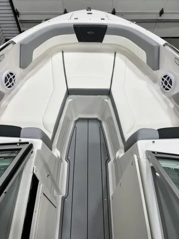 Slide: The Image of 2024 Chaparral 21 SSi boat interior with sleek, modern design and comfortable seating. - 8