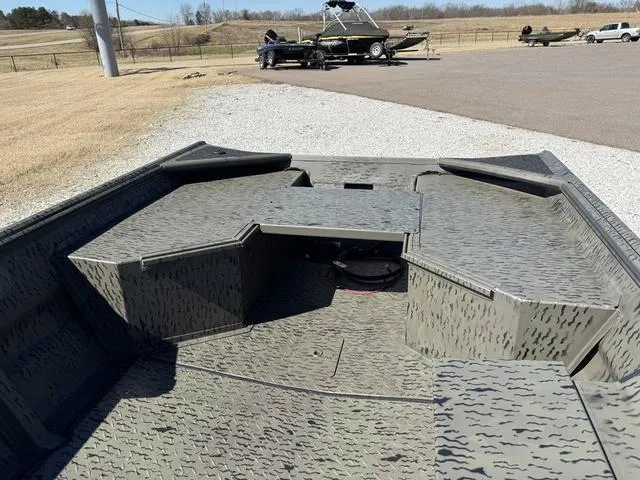 Slide: The Image of 2025 War Eagle 648 LDV boat on trailer at Mid-South Marine dealership. - 7