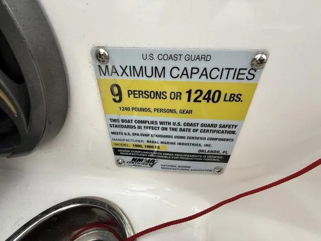 Slide: The Image of U.S. Coast Guard capacity plate for 2014 Regal 1900 ES, 9 persons or 1240 lbs. - 13