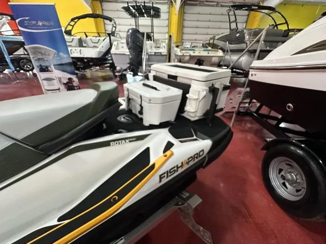 Slide: The Image of 2019 Sea-Doo Fish Pro Waverunner with IBR and sound system, displayed indoors. - 10
