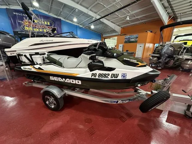 Slide: The Image of 2019 Sea-Doo Fish Pro™ Waverunner with IBR & Sound System on trailer in showroom. - 2