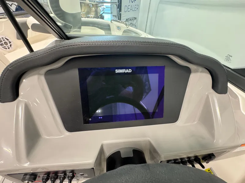 Slide: The Image of Dashboard of 2025 Chaparral 21 SSi Ski & Fish with Simrad display. - 10