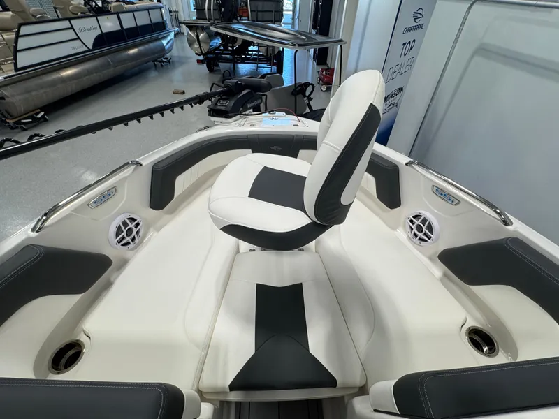 Slide: The Image of 2025 Chaparral 21 SSi Ski & Fish boat interior with seating and speakers. - 15