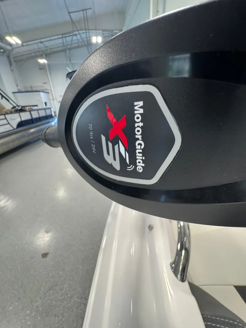 Slide: The Image of MotorGuide X3 motor on 2025 Chaparral 21 SSi Ski & Fish boat in showroom. - 17