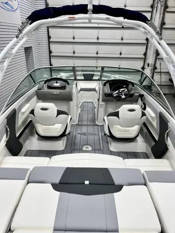 Slide: The Image of 2024 Chaparral 21 SSi boat interior with modern seating and sleek design. - 4