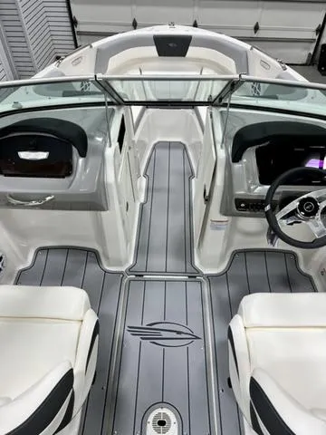 Slide: The Image of 2024 Chaparral 21 SSi boat interior with sleek design and modern dashboard. - 5