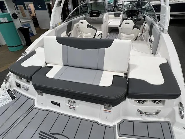 Slide: The Image of 2024 Chaparral 23 SSi boat interior with sleek seating and modern design. - 5