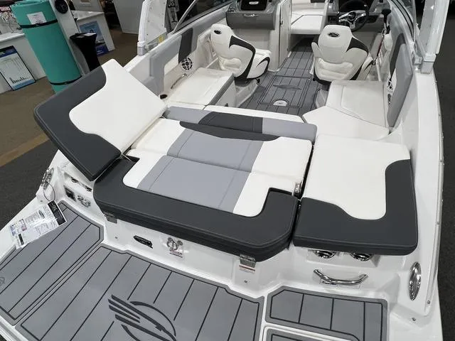 Slide: The Image of 2024 Chaparral 23 SSi boat interior with stylish seating and modern design. - 7