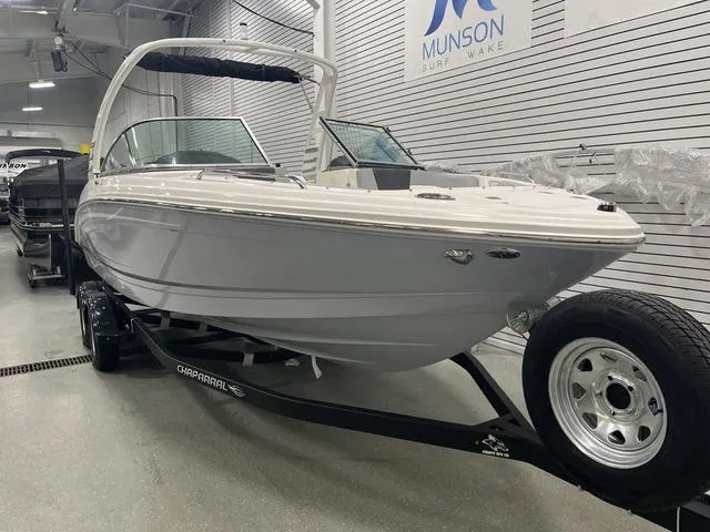 Slide: The Image of 2025 Chaparral 23 SSi boat interior with modern seating and sleek design. - 3