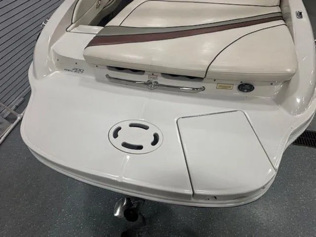Slide: The Image of 2005 Sea Ray 200 Signature boat stern with cushioned seating and swim platform. - 19