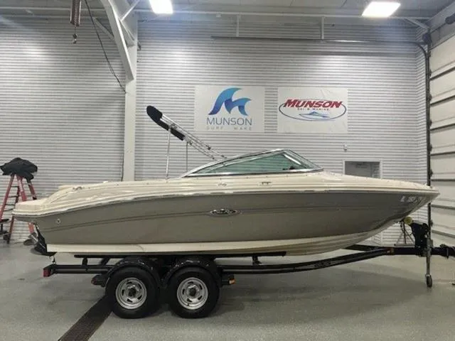 Slide: The Image of 2005 Sea Ray 200 Signature boat on trailer in showroom. - 3