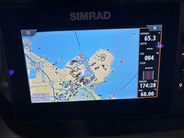 Slide: The Image of Simrad navigation display on 2019 Chaparral 277 SSX, showing nautical map and engine data. - 22