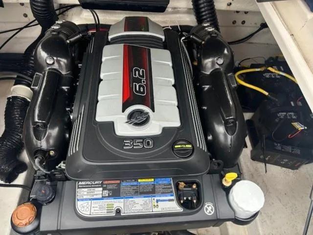 Slide: The Image of Engine of 2019 Chaparral 277 SSX boat, featuring a 6.2L Mercury 350 horsepower motor. - 31