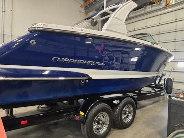 Slide: The Image of 2019 Chaparral 277 SSX boat in a garage on a trailer. - 42