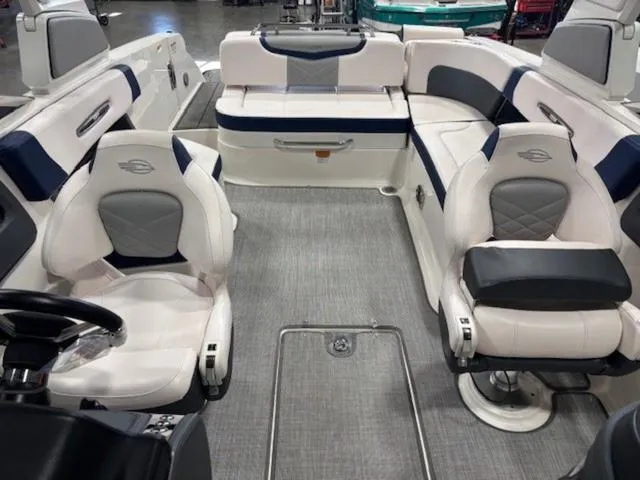 Slide: The Image of 2019 Chaparral 277 SSX boat interior with white and gray seating. - 45