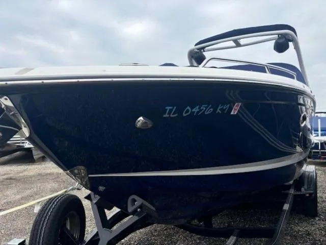 Slide: The Image of 2019 Chaparral 277 SSX boat on trailer, side view, overcast sky. - 9