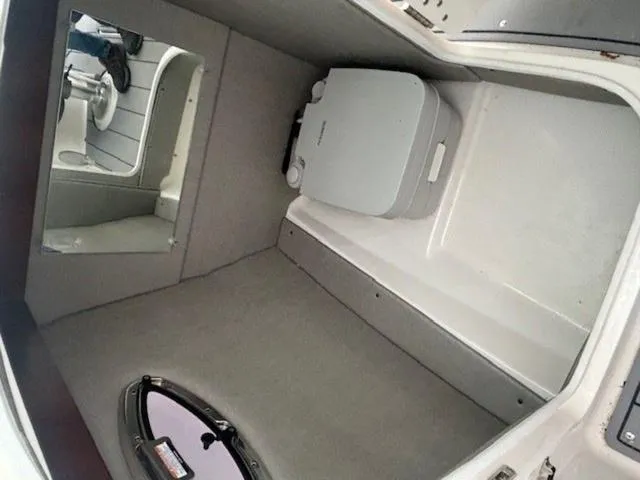 Slide: The Image of Interior cabin of 2020 Chaparral 257 SSX boat with compact toilet. - 16